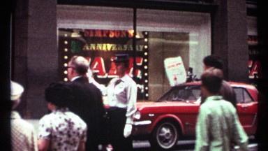 1967: sophisticated woman becomes crossing guard in bustling city as people go