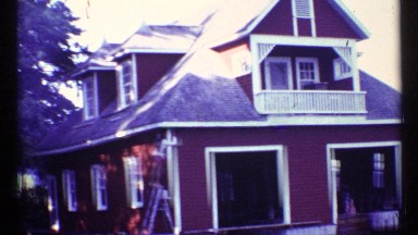 1967: beautiful home with red colour around with beautiful surroundings,people