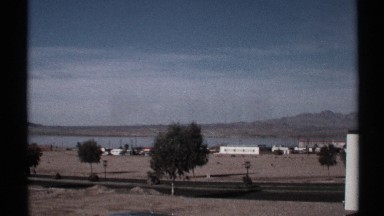 1972: classic cars driving down beachside highway ARIZONA