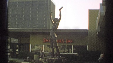 1972: a statue located at the building in front it mentioned a man standing and