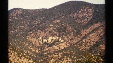1972: A Fairly Steep Sandy Hill in the Desert Speckled with Trees