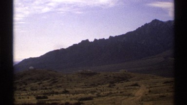 1972: remote place in wilderness at the foot of a mountain range NEW MEXICO