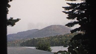 1971: view of mountainous plains from the inside of a window NEW YORK