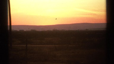 1972: a cute looking nature of morning sunrise time at the sky with ground in