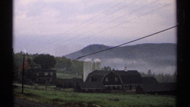1971: A Functional Farm Plantation Beneath a Row of Hills New Hampshire