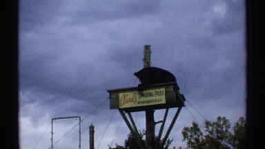 1971: bear tied to trading post sign mid air NEW HAMPSHIRE