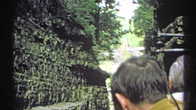1971: narrow opening between rocky walls is part of gorge leading to stream NEW