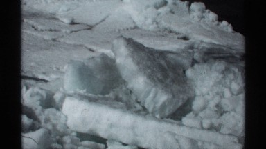 1970: blocks of snow lie on top of each other while the bed of frozen snow has