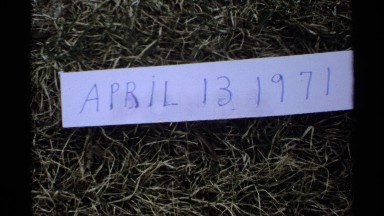 1971: the date of april, 13 1971 written on a white piece of paper, resting on