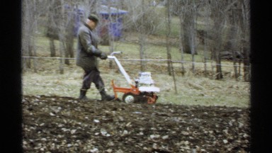 1971: a man tills his barren soil LA CROSSE WISCONSIN