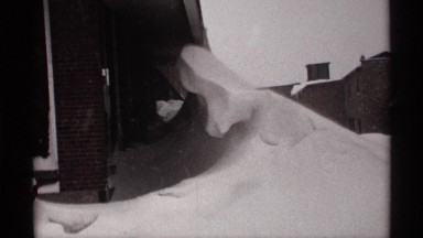 1971: snow almost a story high on downtown main street businesses WISCONSIN