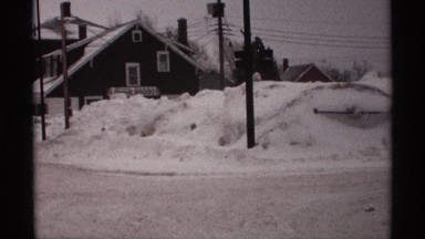 1971: a place full of snow and trees also there a small tent or hunt also at the