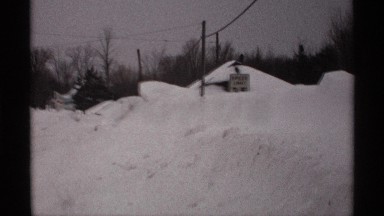 1971: Snowy Day A Road Covered With Snow With A Village Home Covered With Snow
