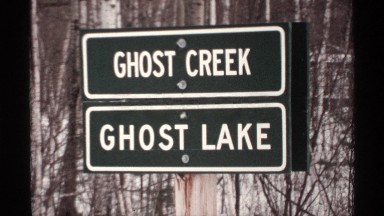 1971: still shot of ghost creek and ghost lake then a cut away to a still of the