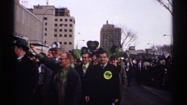 1971: an extremely large crowd of people are outside as people walk through them