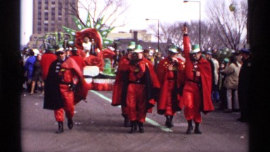1971: some guys are wearing uniform with red colour and talking loud something