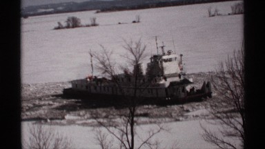 1971: a river and a boat is placed on the opened ground place and it looks like