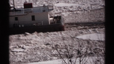 1971: a barge gliding through a canal WISCONSIN