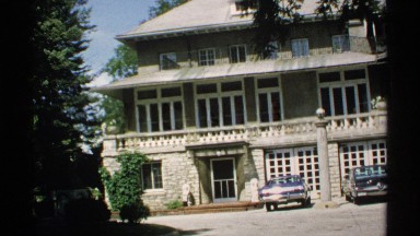 1970: antique cars parked in the driveway at a mansion home. MINNESOTA