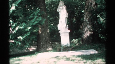 1970: view of statue on wooded lot MINNESOTA
