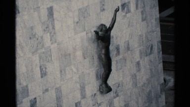 1970: statue is hanged in the wall and wall is very height MINNESOTA