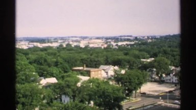 1970: Overhead View of a Neighborhood Nestled in the Woods, MINNESOTA