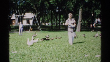1970: a couple enjoying in lawn MINNESOTA