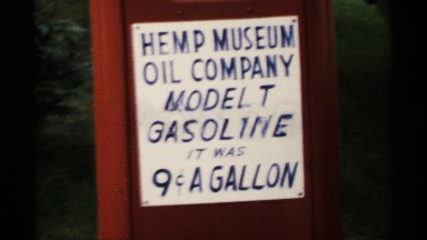 1970: Sign for Hemp Museum Oil Company Advertising Model T Gas at 9 Cents a Gallon