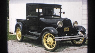 1970: an old and aristocratic vehicle with black color enriched with golden