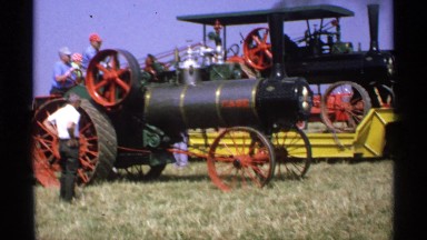 1971: a transport vehicle that moves fast and men trying to drive at the ground