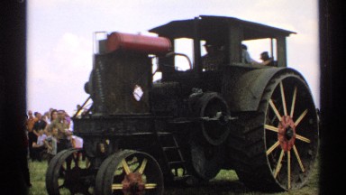 1971: watching a parade where an old tractor model is participating MINNESOTA