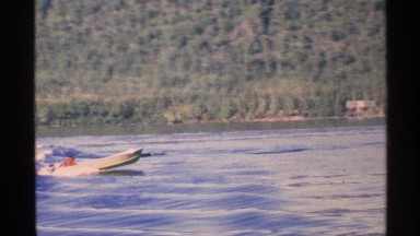 1972: two speedboats moving fast on the waves of the sea on a sunny day ISLE