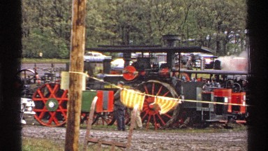 1971: people gathered near a smoke filled area. ROLLAG MINNESOTA