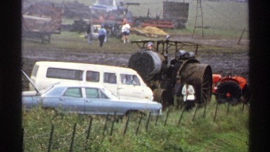 1971: people gather in a field to look at old farm equipment ROLLAG MINNESOTA