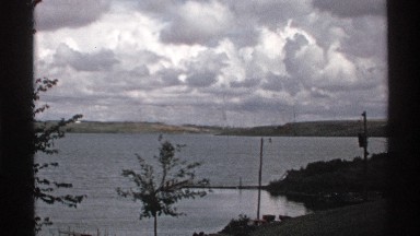 1972: the view of a lake on a very overcast day. the view of the other side of