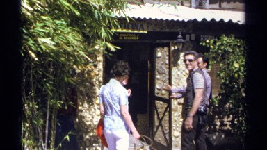 1975: party of adults walking into the door. GUAYMAS MEXICO