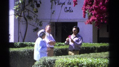 1975: a son taking a flower and put it on his mother's head to make love and