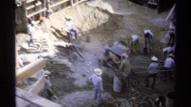 1975: people are doing construction work at the morning time very sincere for