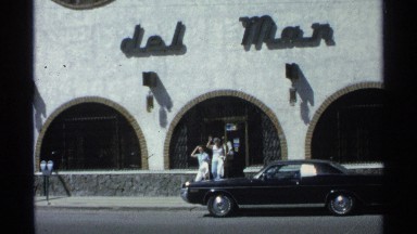 1975: two women and and a man are leaving the del mar market place. GUAYMAS