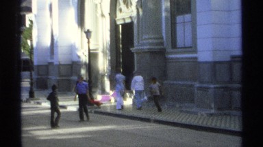 1975: group of children visiting with their parents,playing with each other