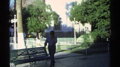 1975: a building that looks like so large and may be a religion place and trees