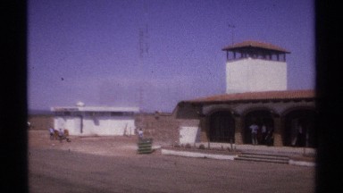 1974: A Straight Long Building Situated at the Side of a Road LA Paz Mexico