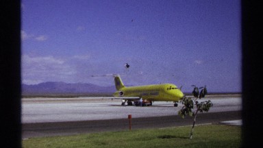1974: small airplanes with yellow and white colors remaining landed in the