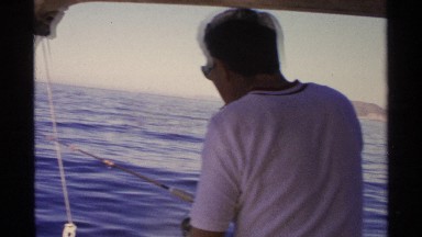 1975: amateur fisherman taking a happy and pleasant day trip out on boat to do