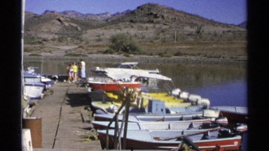 1975: a place looks like a harbor and more boats are available that mean