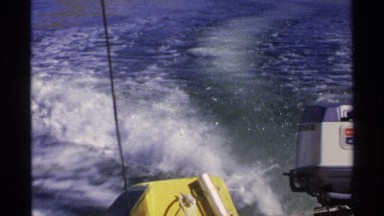 1975: view from back of motor boat as vessel speeds through the water GUAYMAS