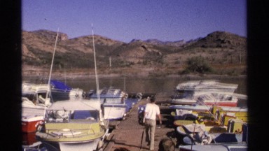 1975: more boats are landing at the corner of the place and water mountain also
