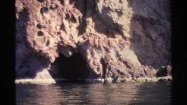 1975: an eerie desert canyon with water at the bottom, a place that looks remote