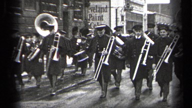 1937: People Walking with Instrumental Music and Making a Parade for a