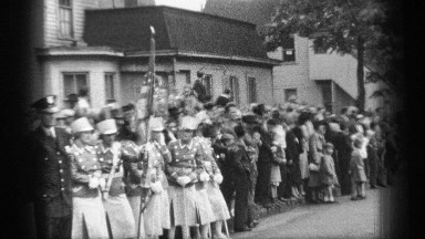 1937: Groups of People Gathered on a Street in Cleveland Ohio